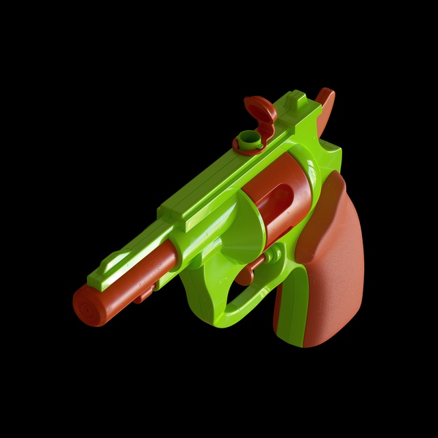 Plastic green and orange water pistol with fill cap open